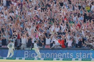 England fans in the Western Terrace celebrate as Ben Stokes puts a six into the crowd.
